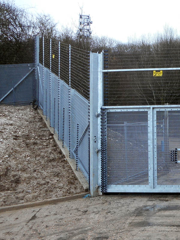 Raking Security Fence