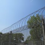 Flat Wrap Razor Wire fencing deters intruders fence toppings