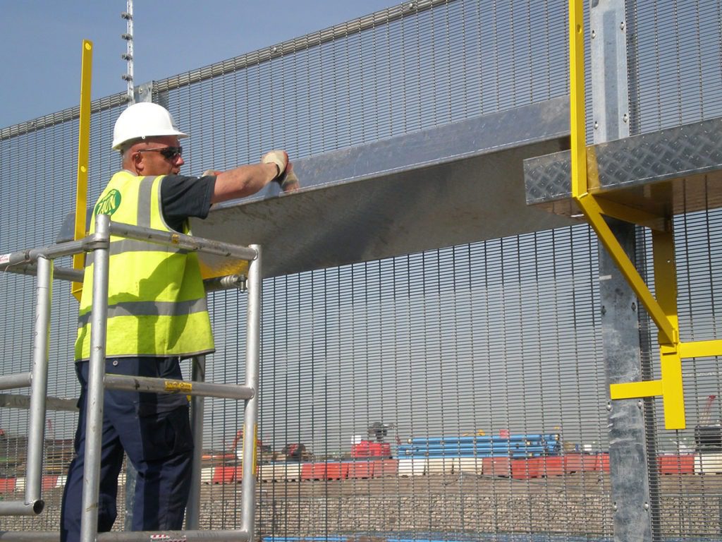 Innovative Walkway System for Working at Heights Installation of Electric Fencing